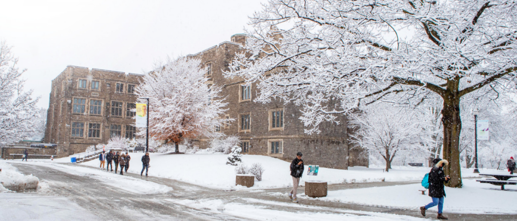 students on snow covered campus